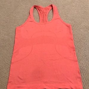 Pink lululemon swiftly tank